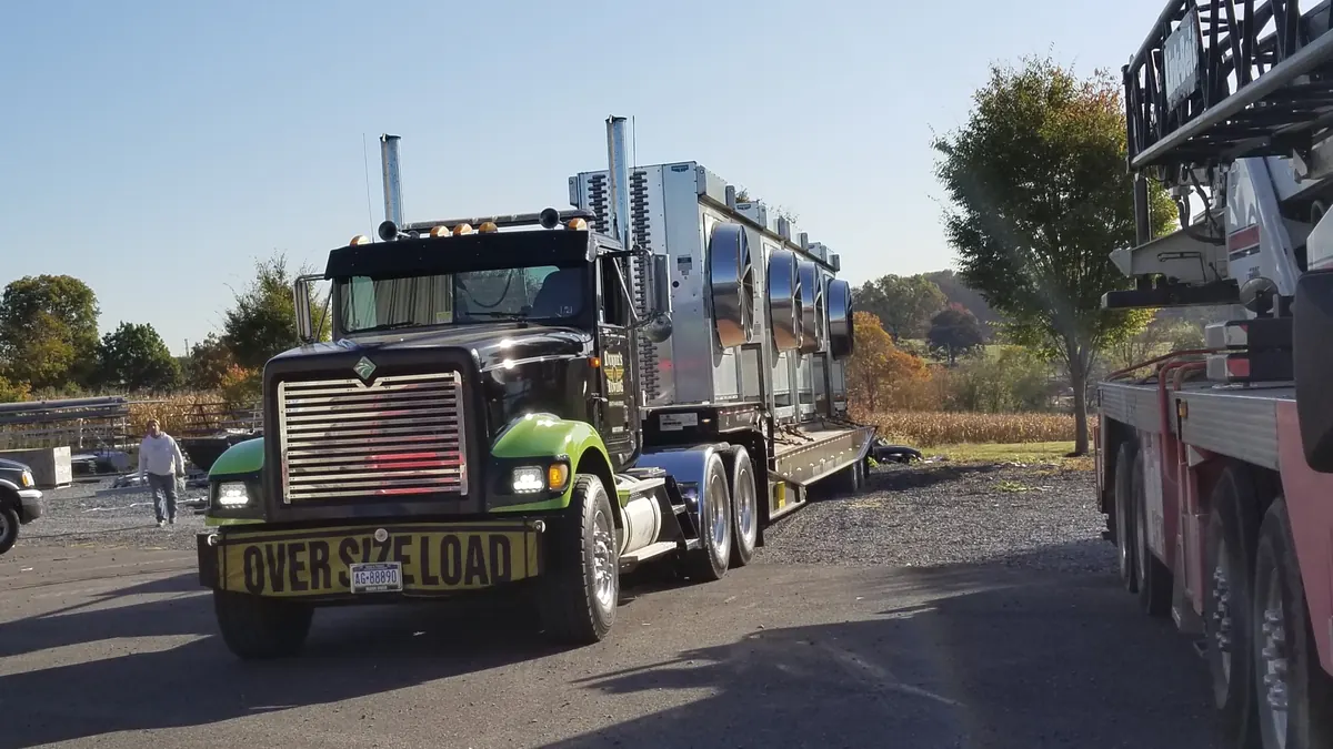 Dunne&rsquo;s tractor with an oversize load sign